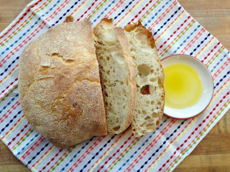 Paesano bread sliced with olive oil