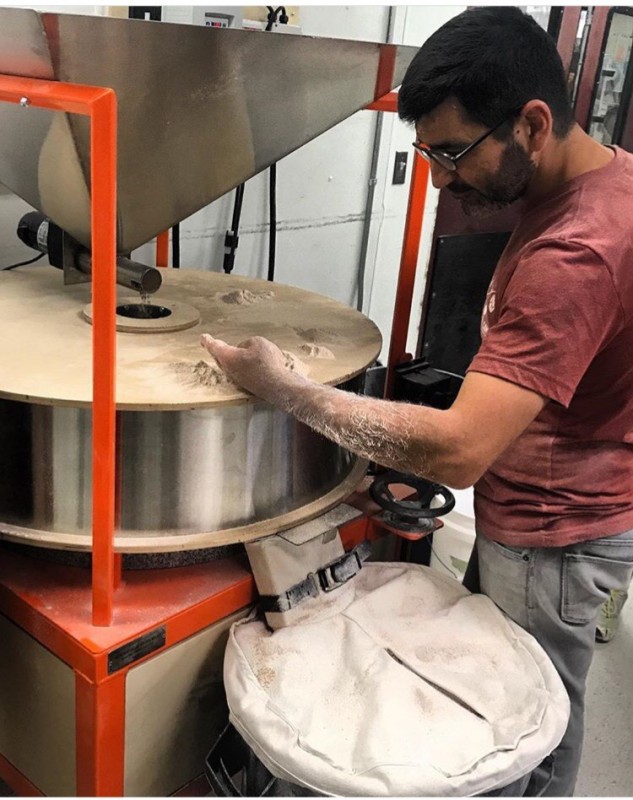 Hazim Tugun at the helm of the Bakehouse’s first New American Stone Mill.