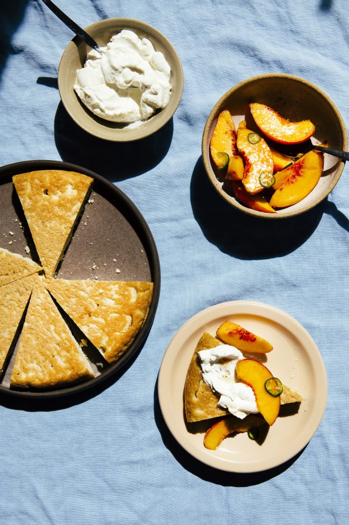 overhead view of cornbread with peaches
