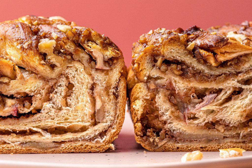 Eve's Apple Babka, cut in half with cut ends facing the viewer