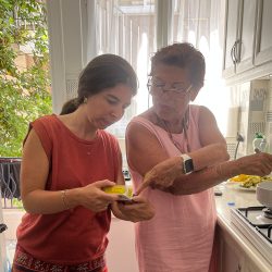 Lian and Aunt Simone cooking together in the kitchen