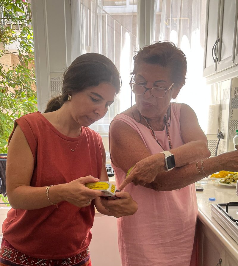 Lian and Aunt Simone cooking together in the kitchen