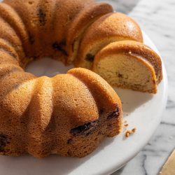 sour cream coffee cake on a cake stand