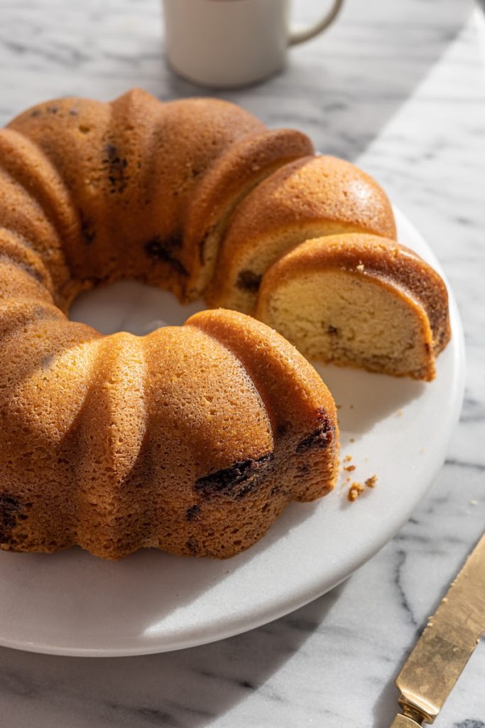 sour cream coffee cake on a cake stand