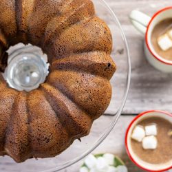 Ari's Pick: Hot Cocoa Coffee Cake hot cocoa coffee cake and two mugs of cocoa with marshmallows in them