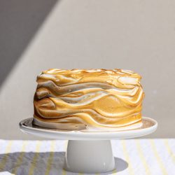 Ari's Pick: Lemon Sponge Cake for Passover and More! lemon sponge cake on a white cake stand