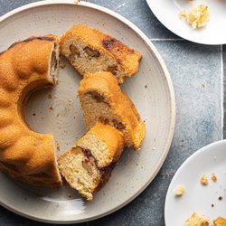 small sour cream coffee cake, partially sliced