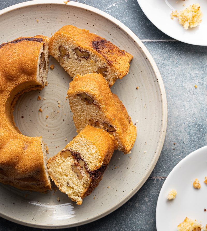 small sour cream coffee cake, partially sliced