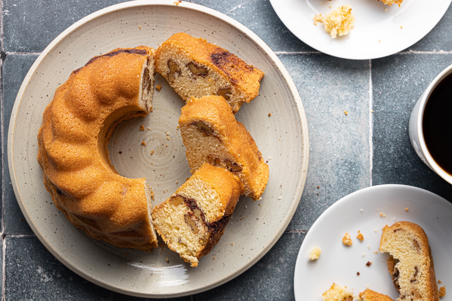 small sour cream coffee cake, partially sliced